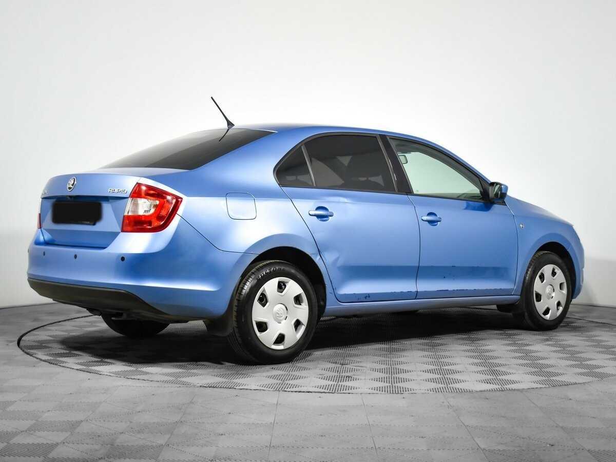 Купить Skoda Rapid с пробегом. Фото: #4