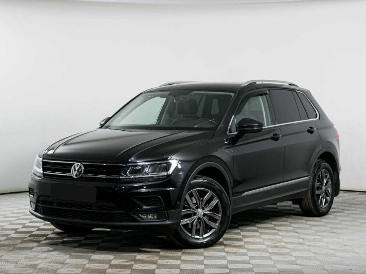 Купить Volkswagen Tiguan с пробегом. Посмотреть фото