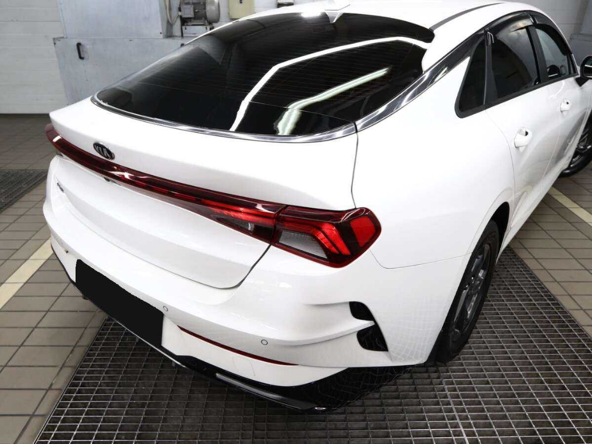 Купить Kia K5 с пробегом. Фото: #4