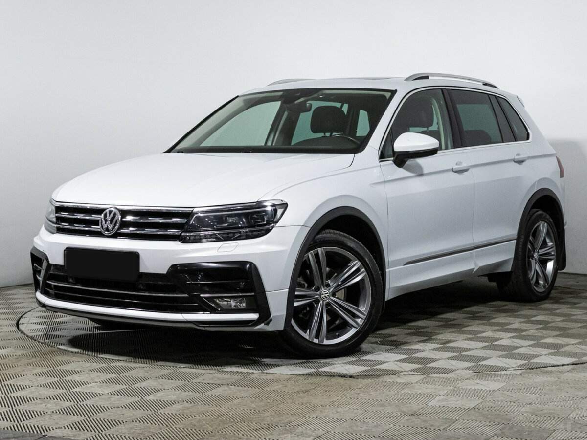 Купить Volkswagen Tiguan с пробегом. Посмотреть фото