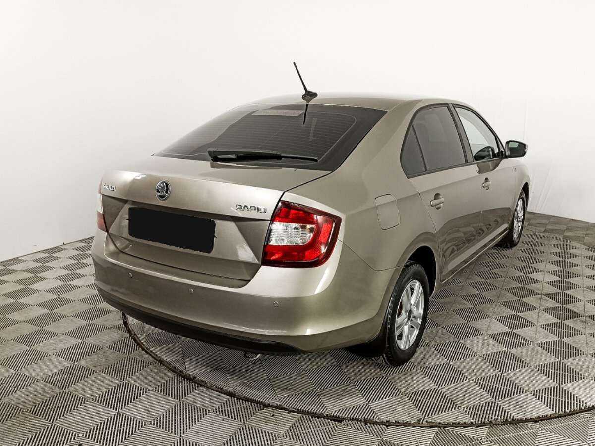 Купить Skoda Rapid с пробегом. Фото: #4