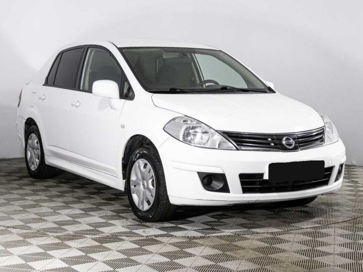 Купить Nissan Tiida с пробегом. Фото: #2