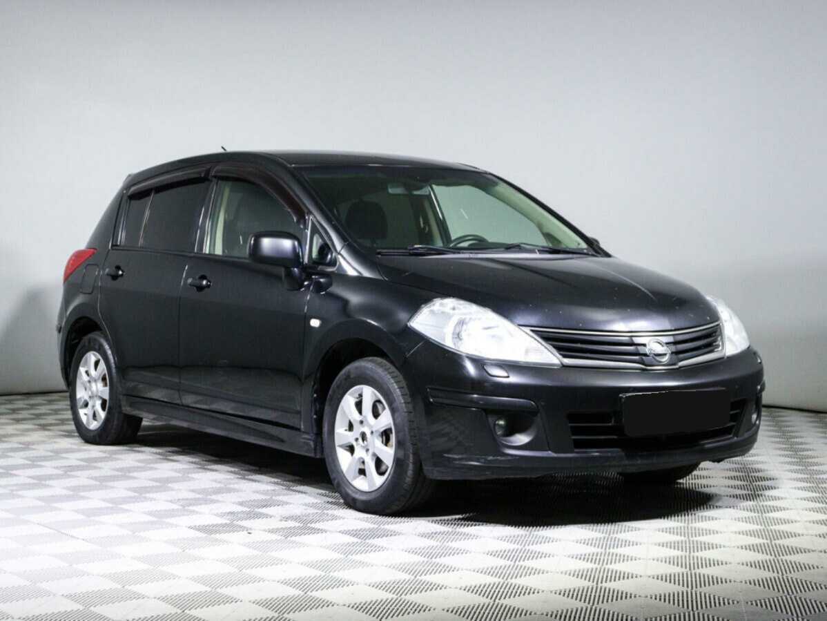Купить Nissan Tiida с пробегом. Фото: #2