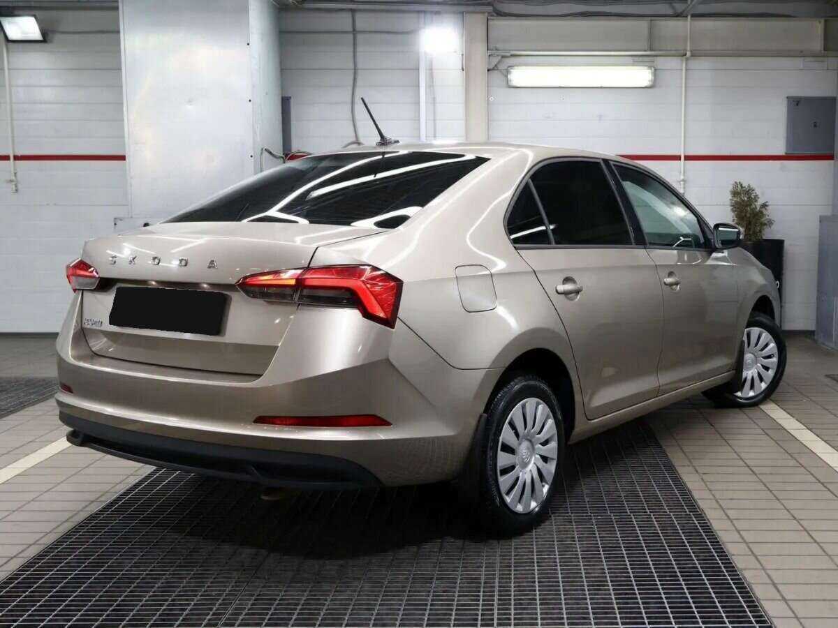Купить Skoda Rapid с пробегом. Фото: #2