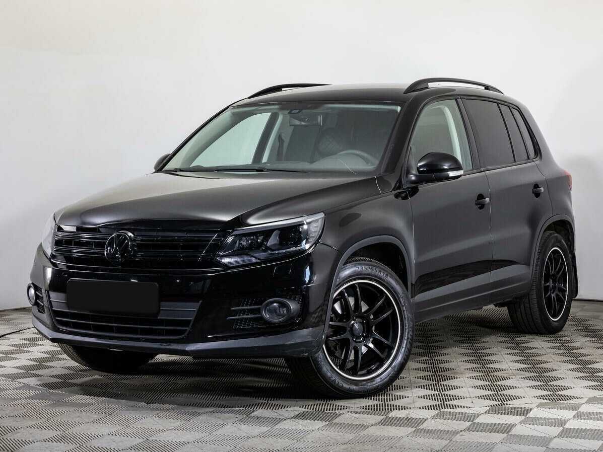 Купить Volkswagen Tiguan с пробегом. Посмотреть фото