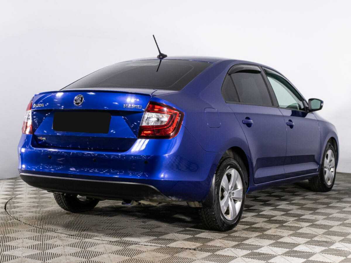 Купить Skoda Rapid с пробегом. Фото: #4
