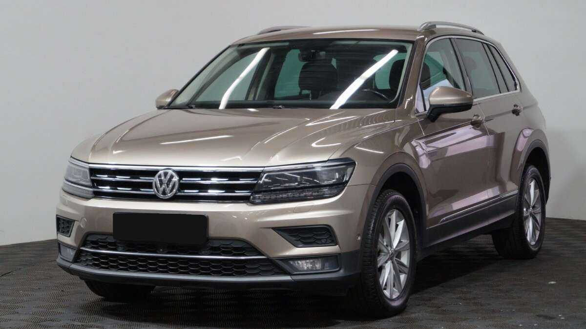 Купить Volkswagen Tiguan с пробегом. Посмотреть фото