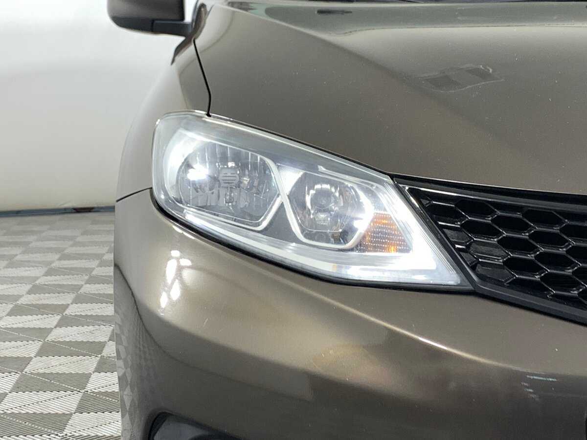 Купить Nissan Tiida с пробегом. Фото: #9