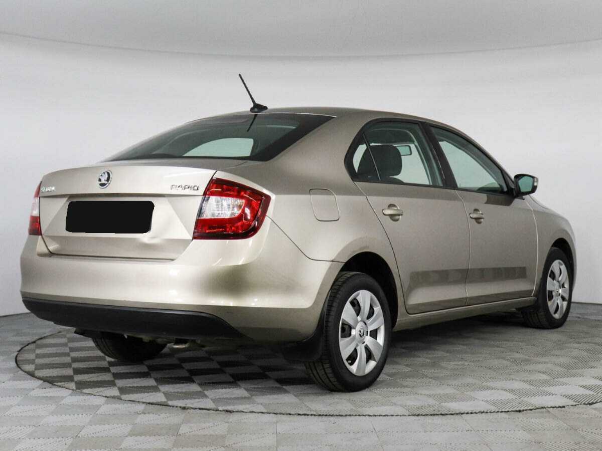 Купить Skoda Rapid с пробегом. Фото: #4