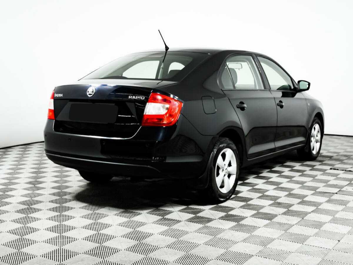 Купить Skoda Rapid с пробегом. Фото: #4