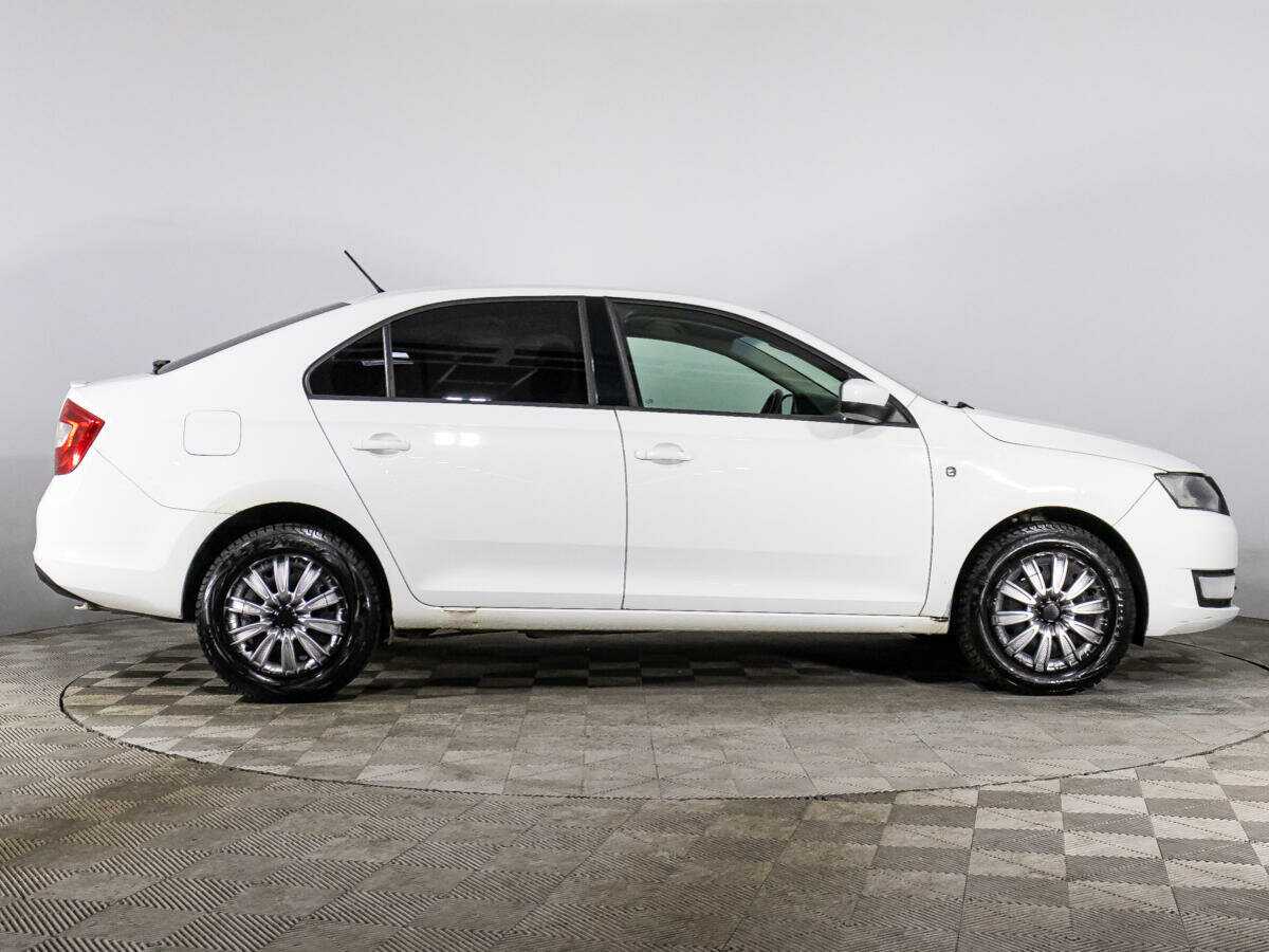 Купить Skoda Rapid с пробегом. Фото: #1