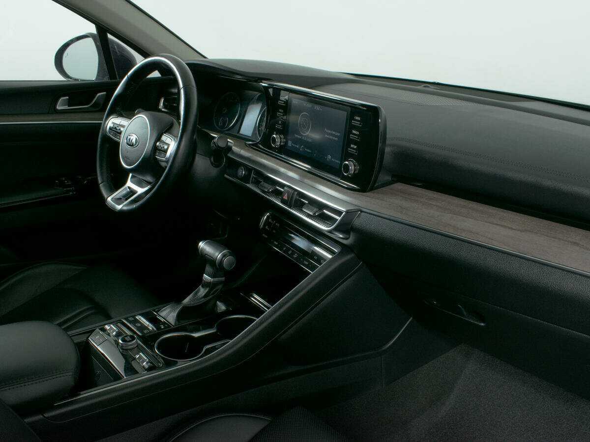 Купить Kia K5 с пробегом. Фото: #9