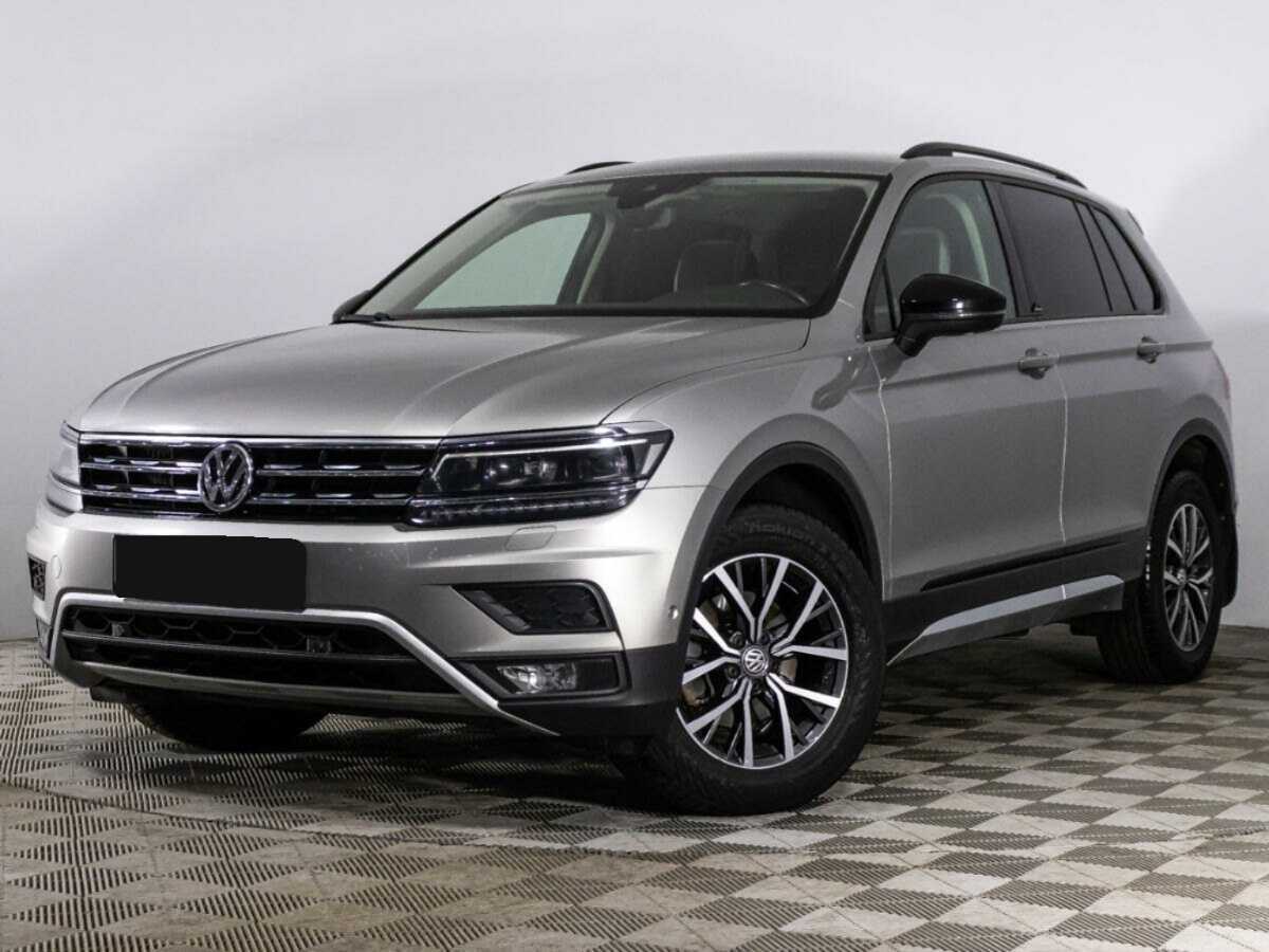 Купить Volkswagen Tiguan с пробегом. Посмотреть фото