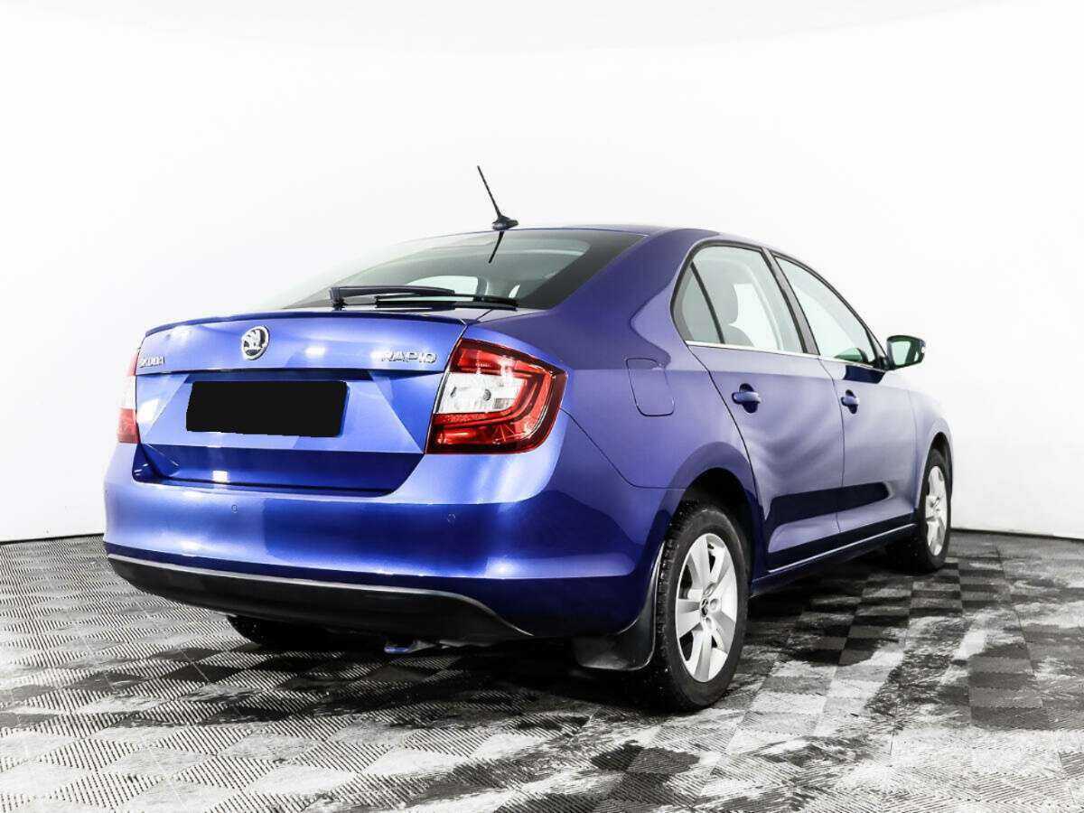 Купить Skoda Rapid с пробегом. Фото: #4