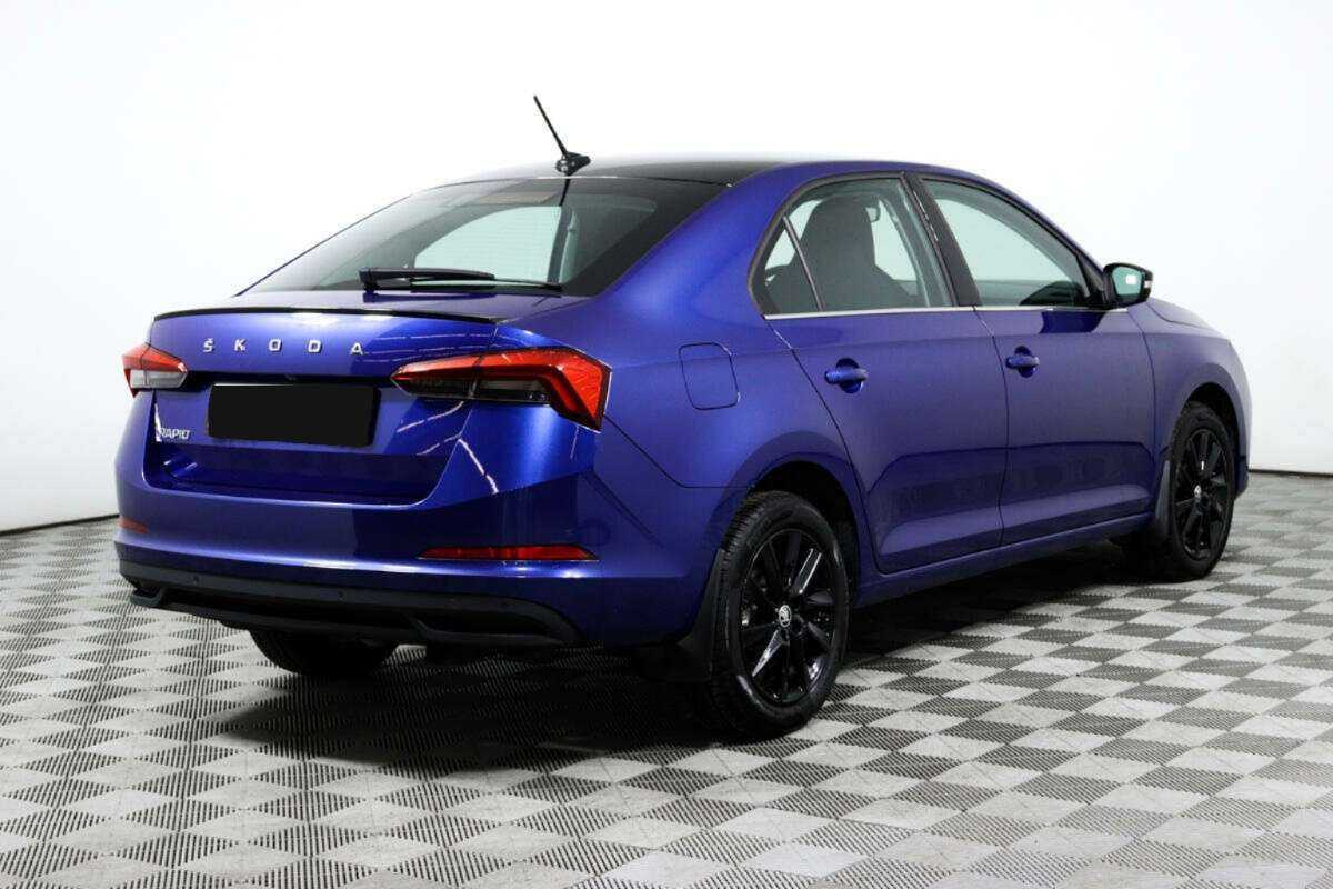 Купить Skoda Rapid с пробегом. Фото: #4