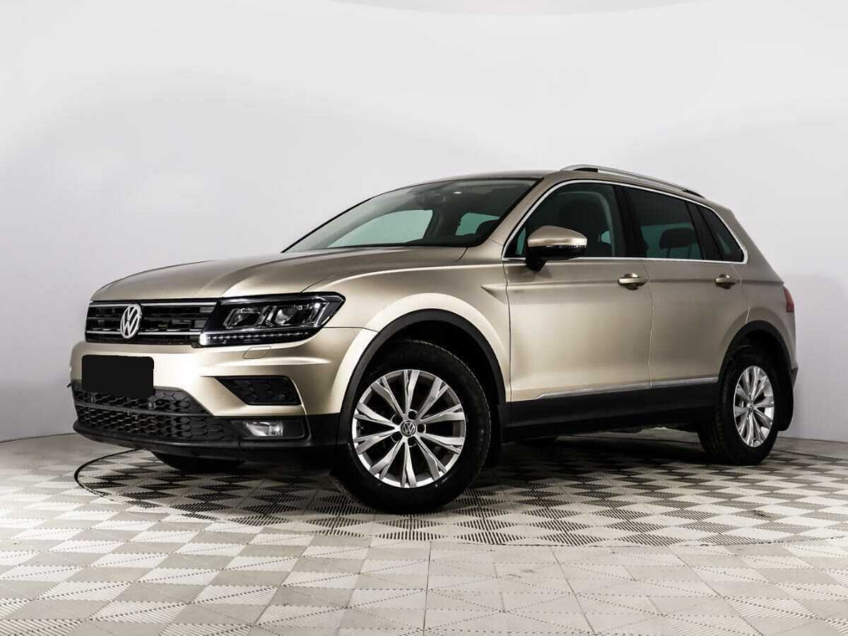 Купить Volkswagen Tiguan с пробегом. Посмотреть фото