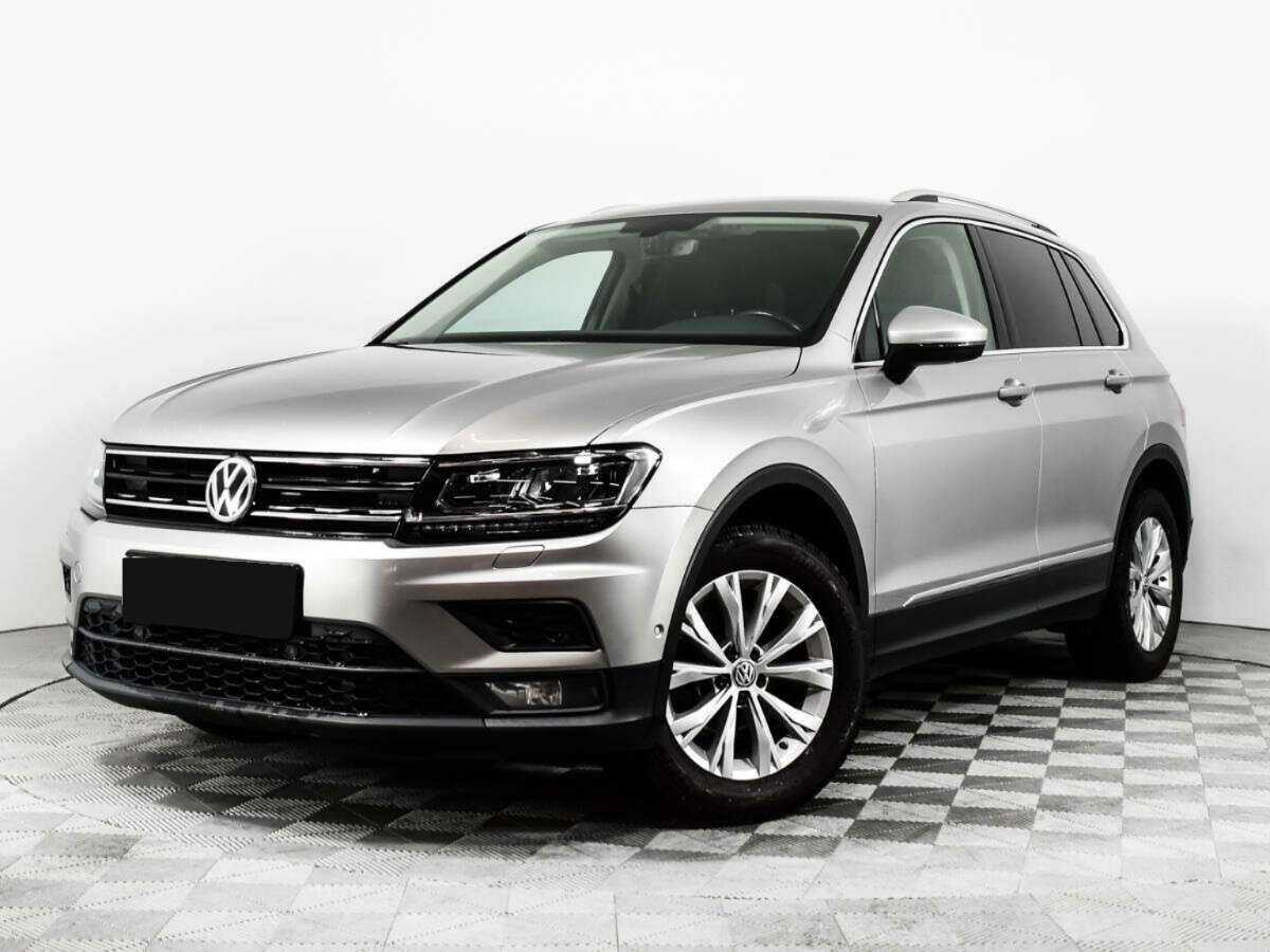 Купить Volkswagen Tiguan с пробегом. Посмотреть фото