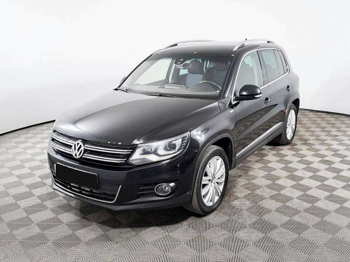 Купить Volkswagen Tiguan с пробегом. Посмотреть фото