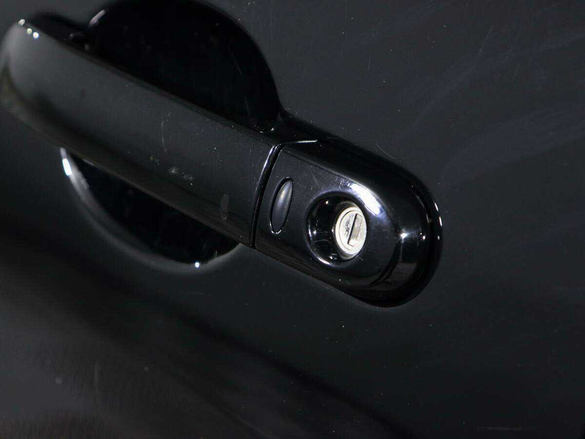 Купить Nissan Tiida с пробегом. Фото: #14