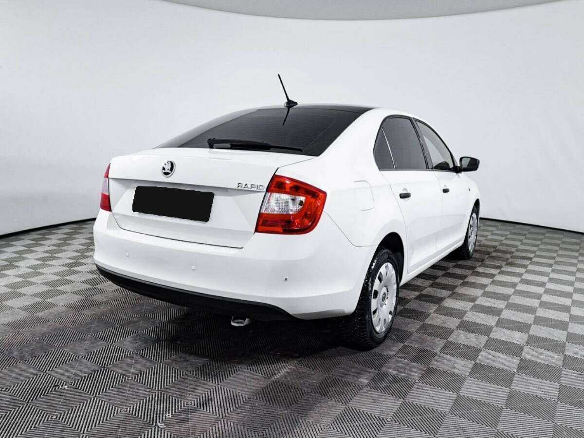 Купить Skoda Rapid с пробегом. Фото: #4