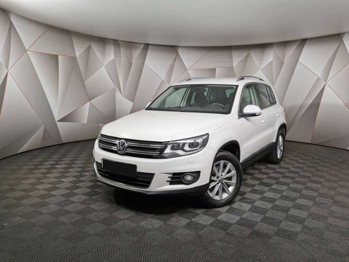 Купить Volkswagen Tiguan с пробегом. Посмотреть фото