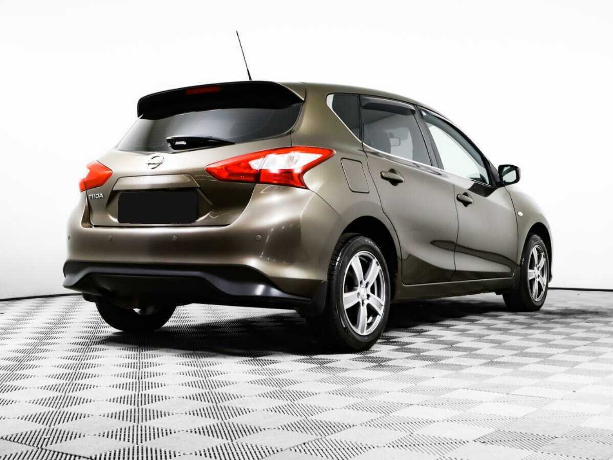 Купить Nissan Tiida с пробегом. Фото: #3