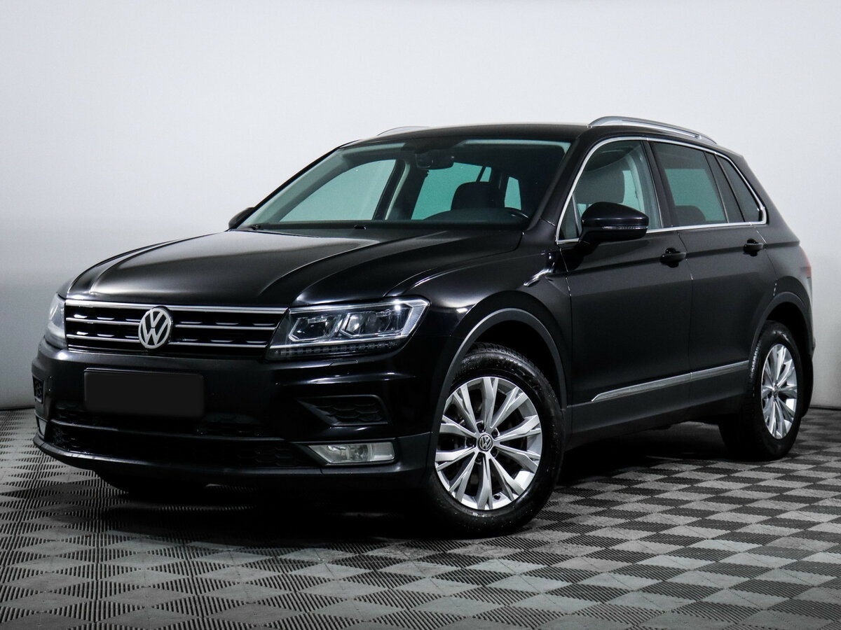 Купить Volkswagen Tiguan с пробегом. Посмотреть фото