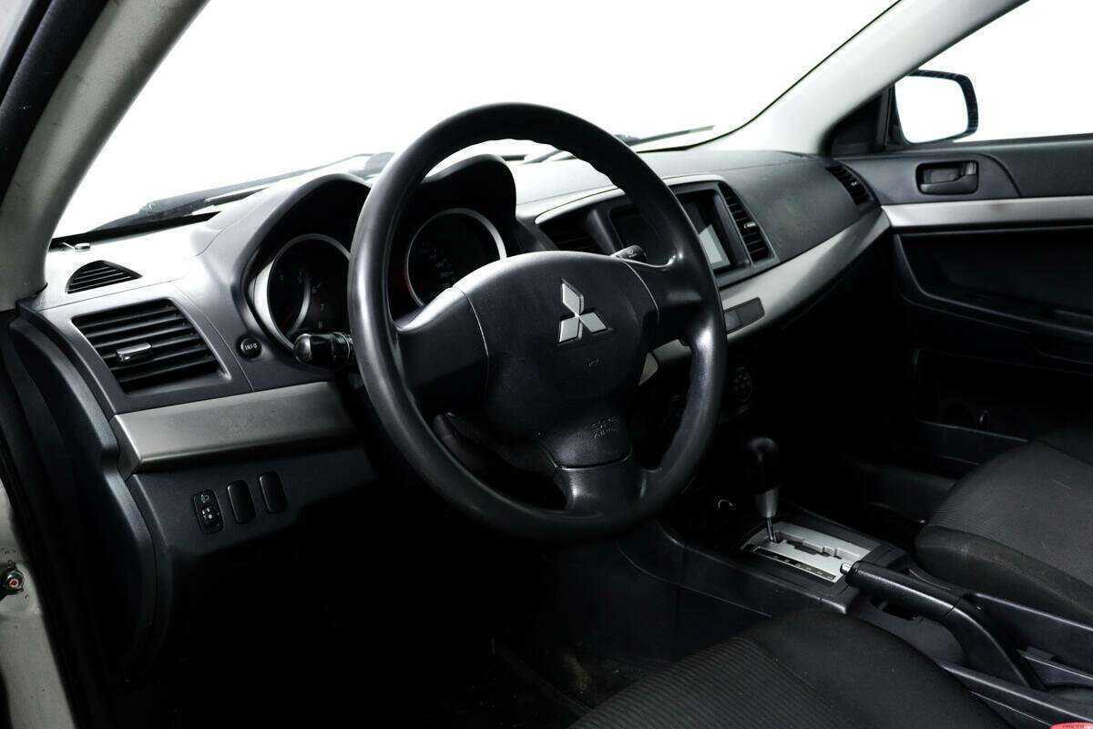 Купить Mitsubishi Lancer с пробегом. Фото: #12