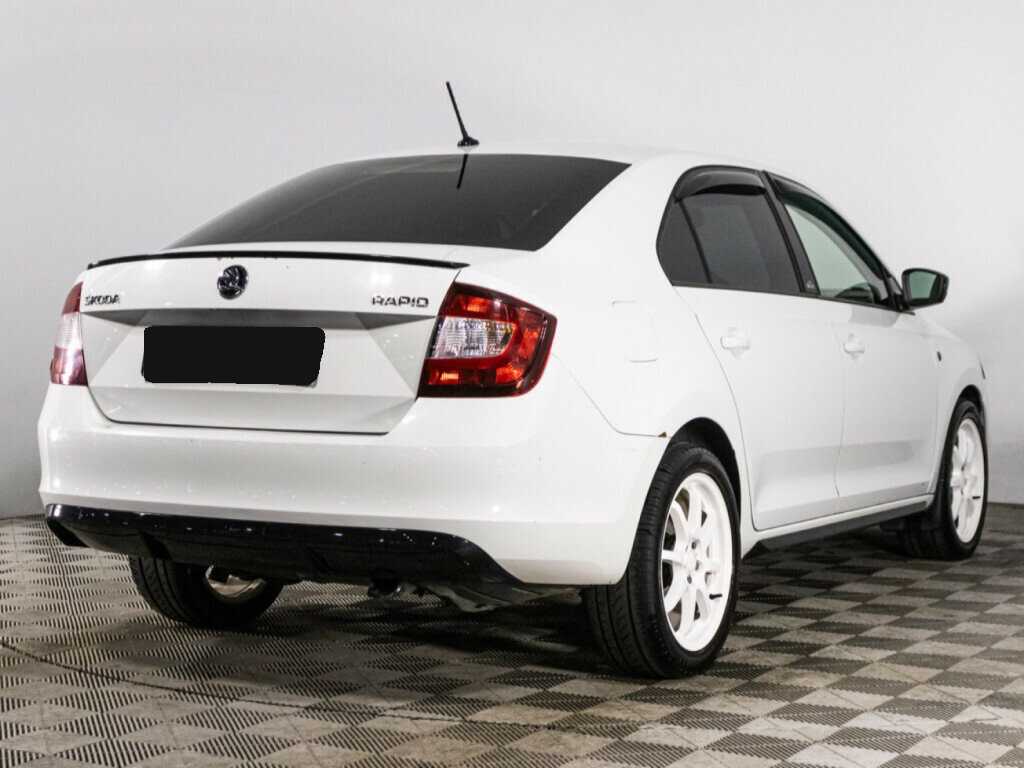 Купить Skoda Rapid с пробегом. Фото: #4