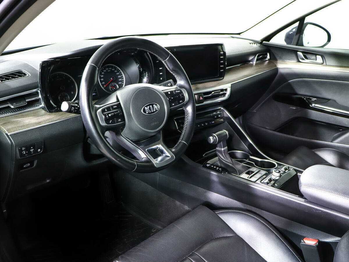 Купить Kia K5 с пробегом. Фото: #11