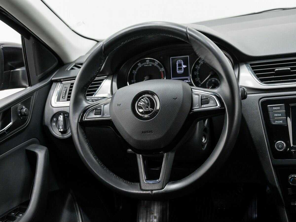 Купить Skoda Rapid с пробегом. Фото: #9