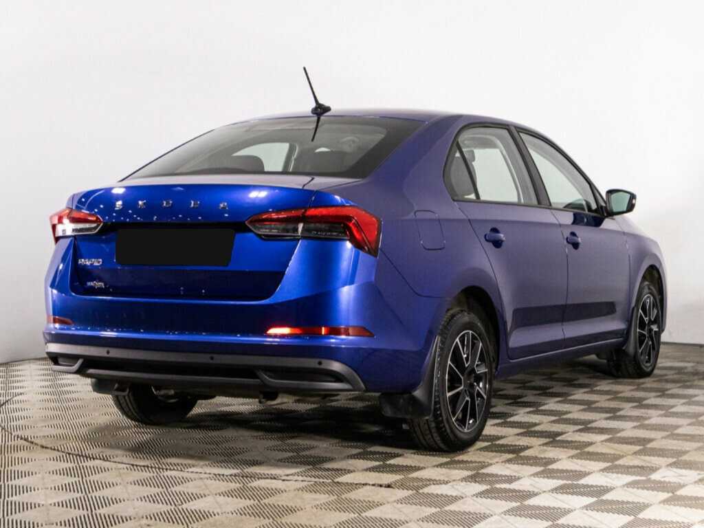 Купить Skoda Rapid с пробегом. Фото: #4