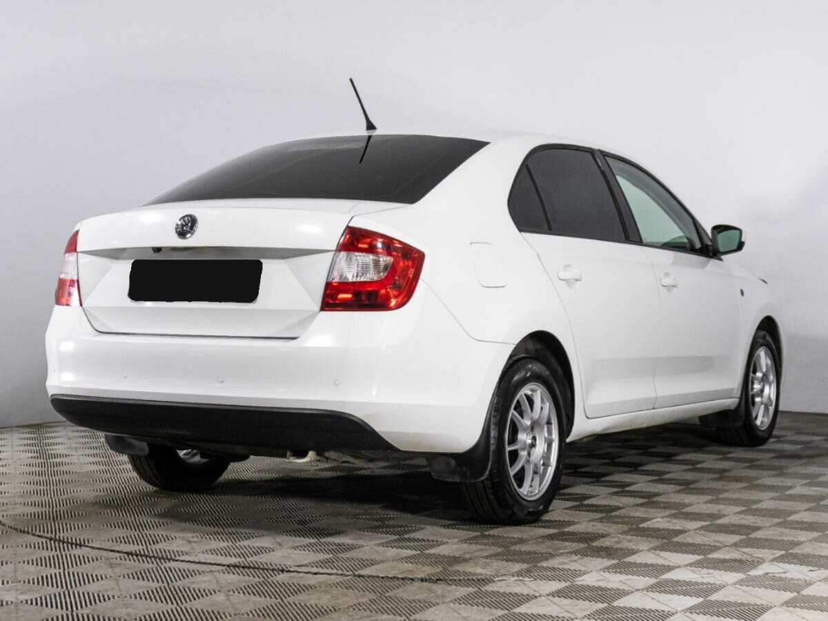 Купить Skoda Rapid с пробегом. Фото: #4