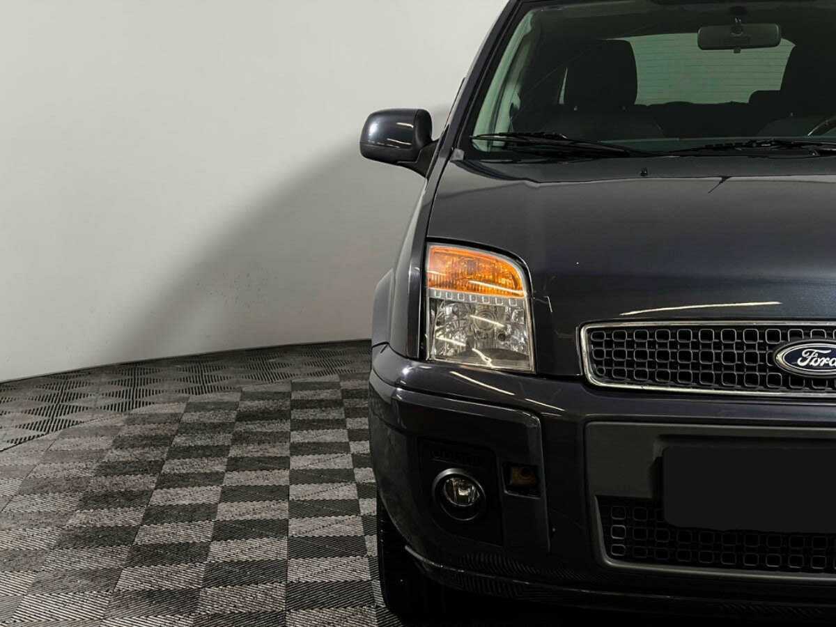 Купить Ford Fusion с пробегом. Фото: #11