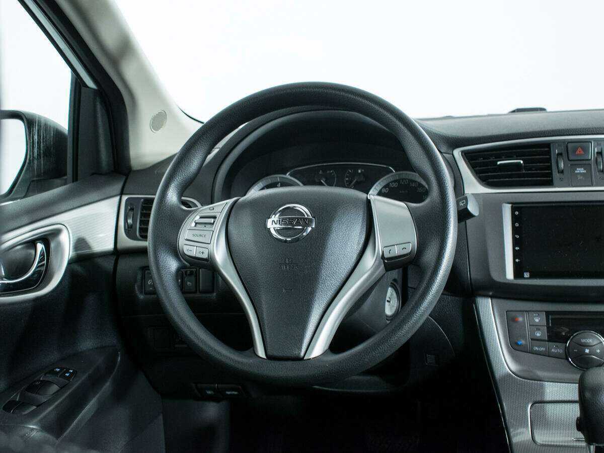 Купить Nissan Tiida с пробегом. Фото: #13