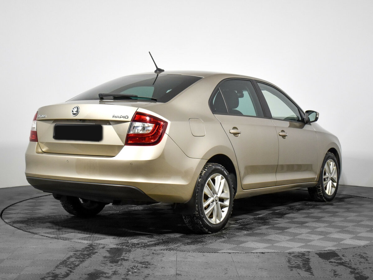 Купить Skoda Rapid с пробегом. Фото: #4