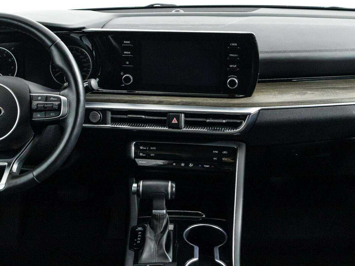 Купить Kia K5 с пробегом. Фото: #13