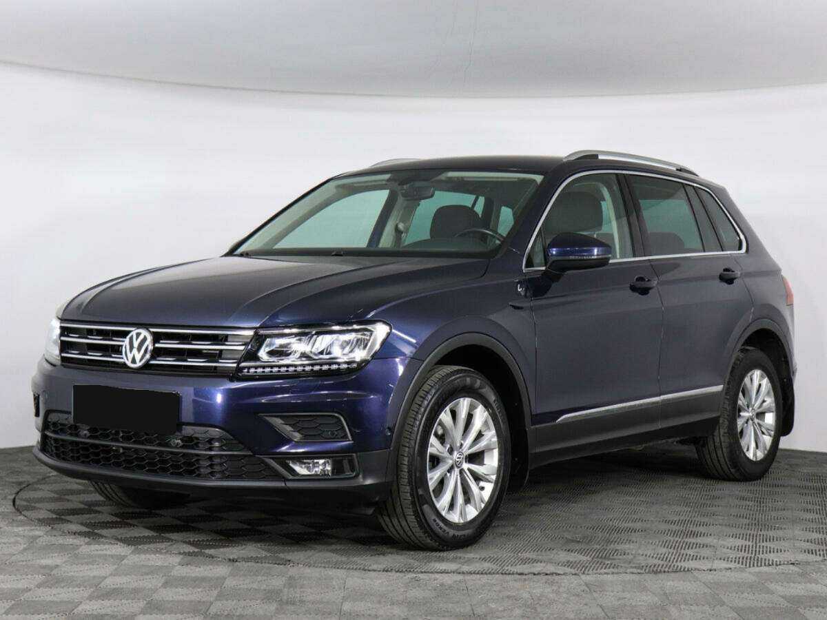 Купить Volkswagen Tiguan с пробегом. Посмотреть фото