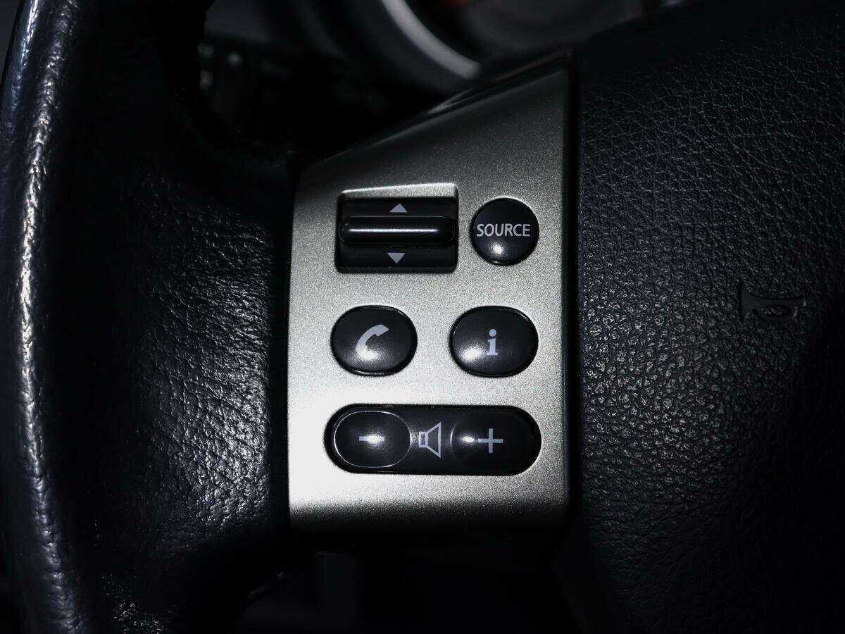 Купить Nissan Tiida с пробегом. Фото: #17