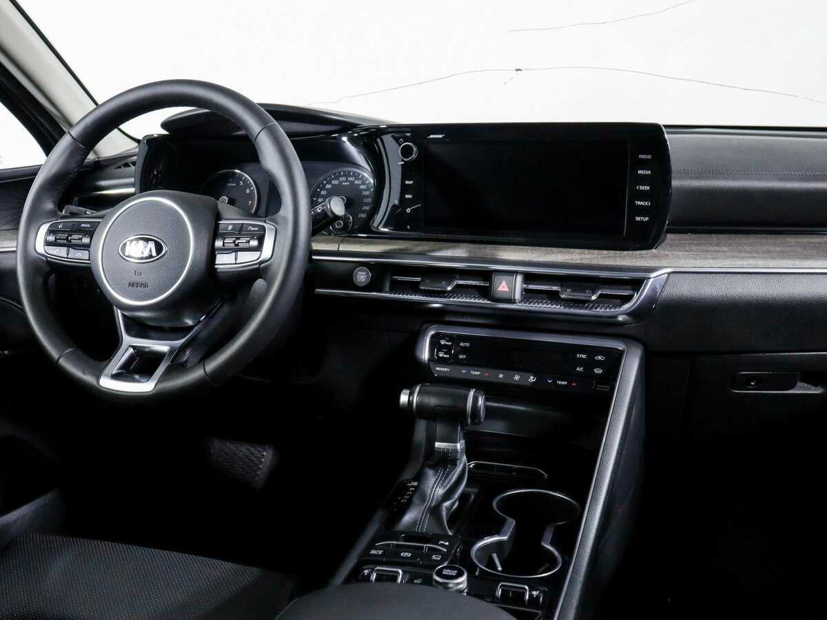 Купить Kia K5 с пробегом. Фото: #11