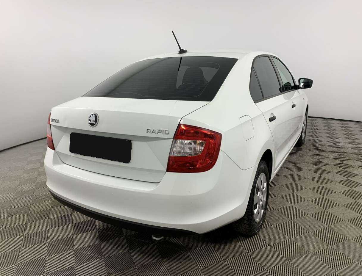 Купить Skoda Rapid с пробегом. Фото: #4