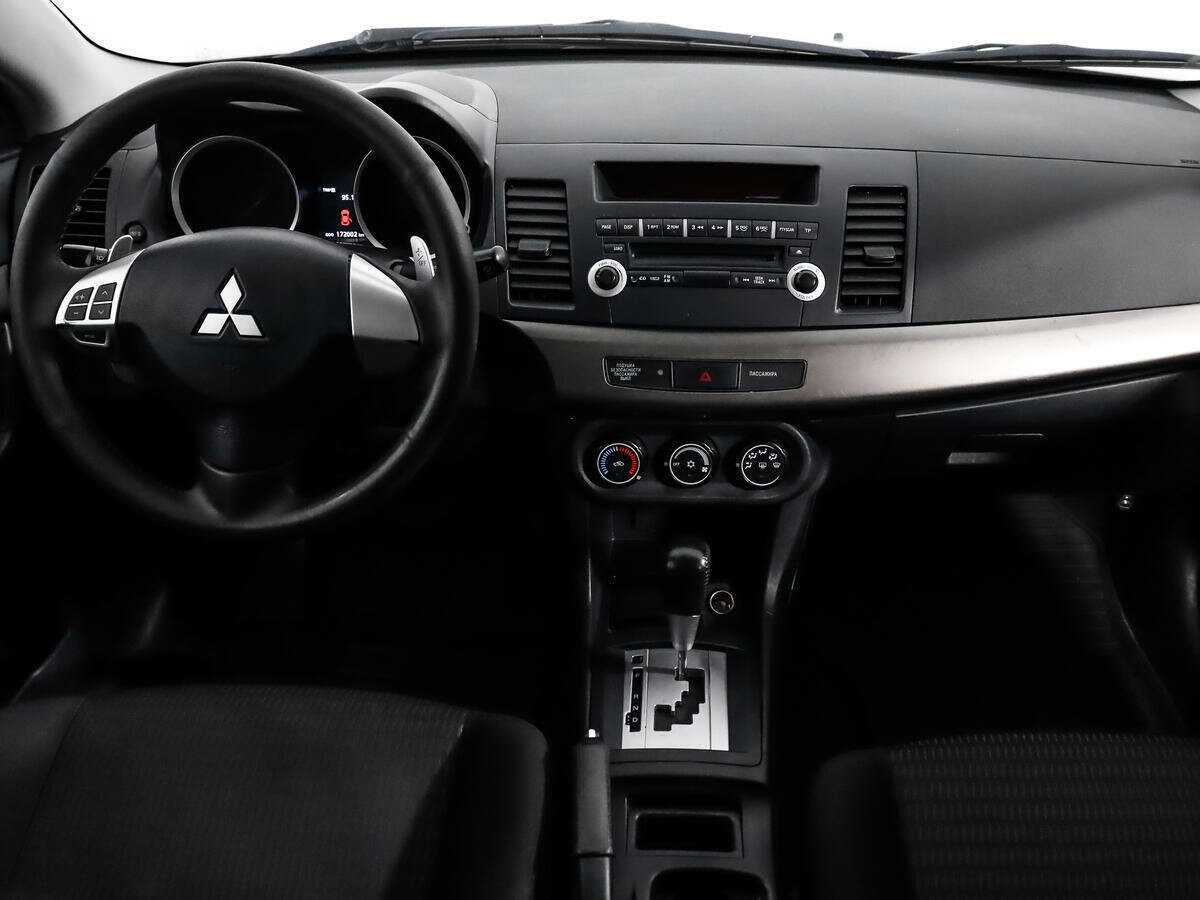 Купить Mitsubishi Lancer с пробегом. Фото: #9