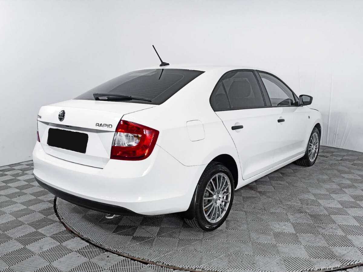 Купить Skoda Rapid с пробегом. Фото: #4
