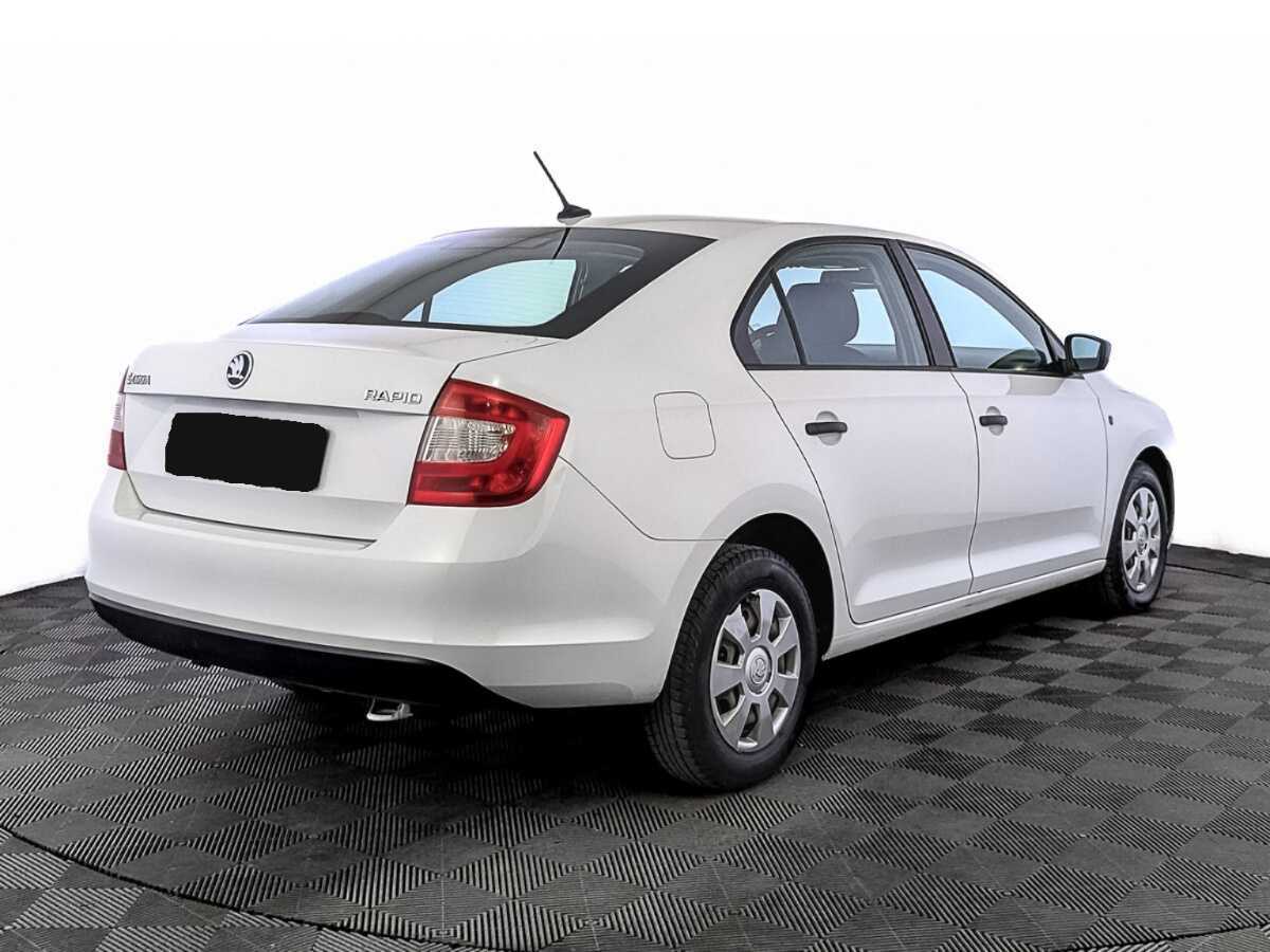 Купить Skoda Rapid с пробегом. Фото: #4