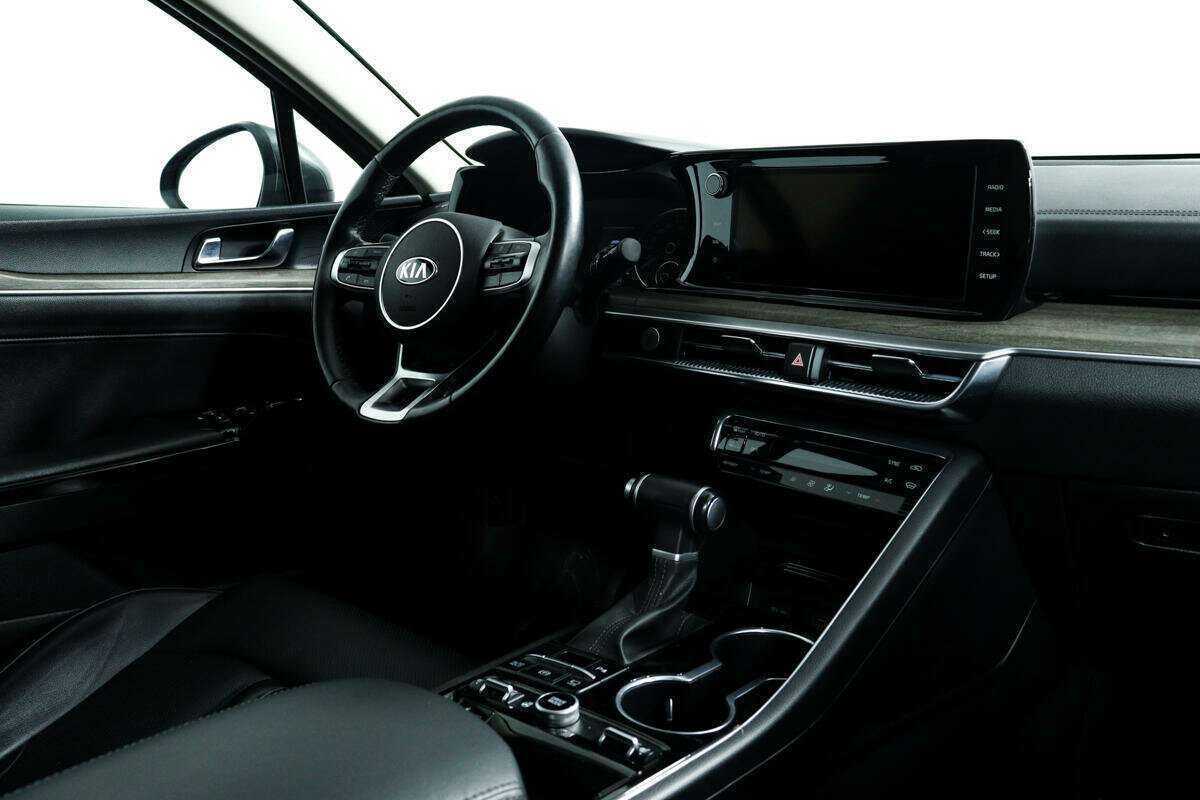 Купить Kia K5 с пробегом. Фото: #8