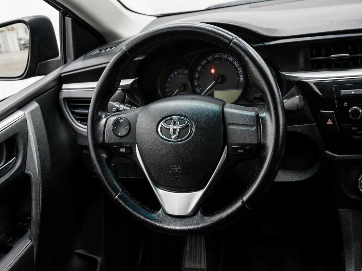 Купить Toyota Corolla с пробегом. Фото: #11