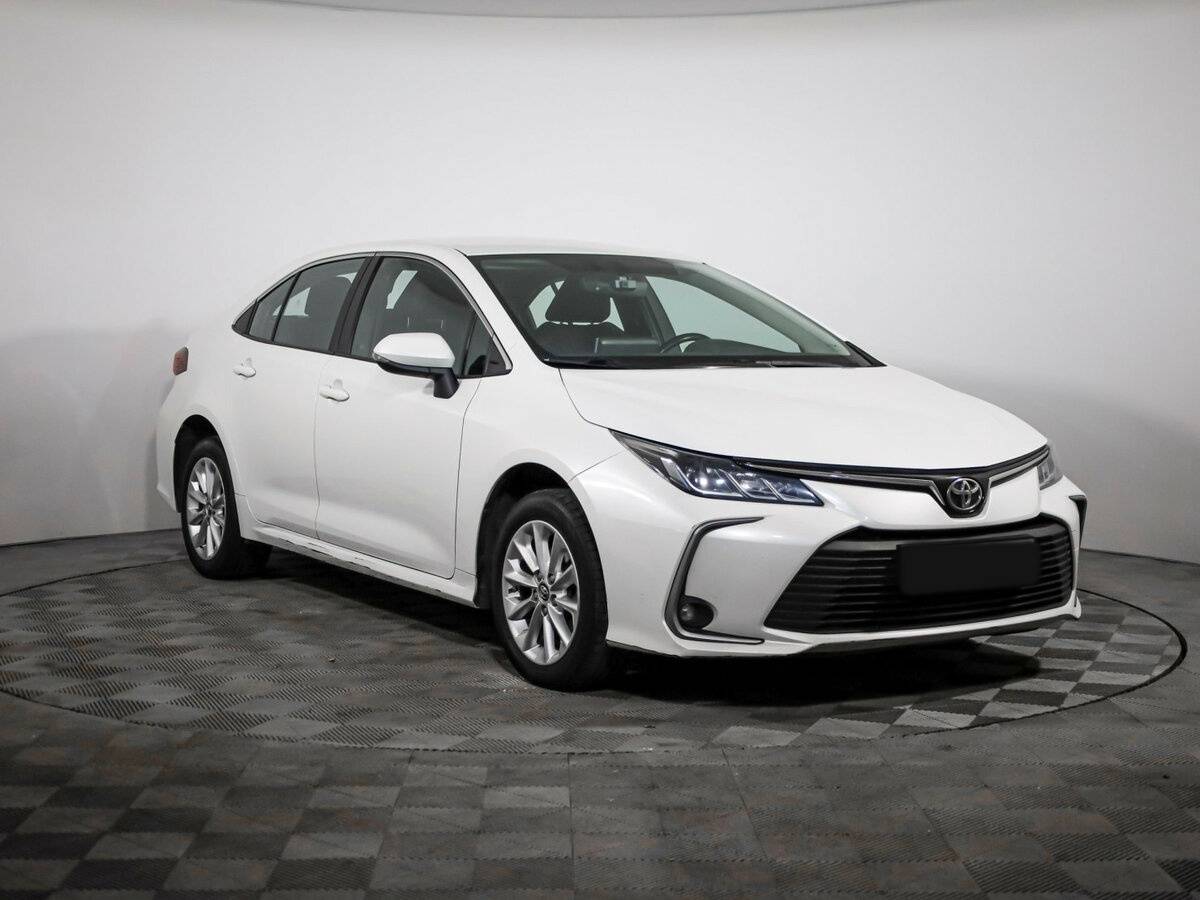 Купить Toyota Corolla с пробегом. Фото: #2
