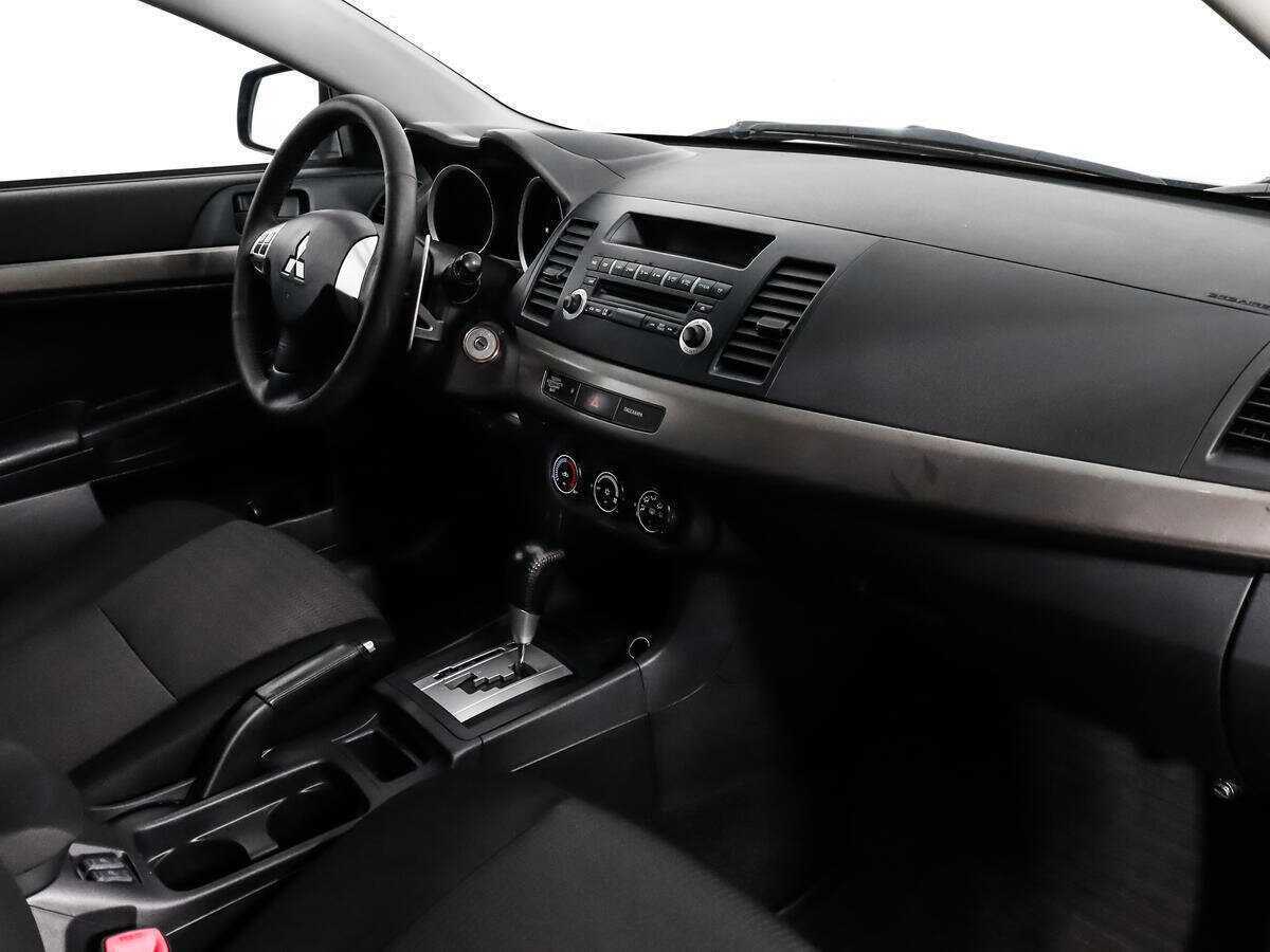 Купить Mitsubishi Lancer с пробегом. Фото: #8