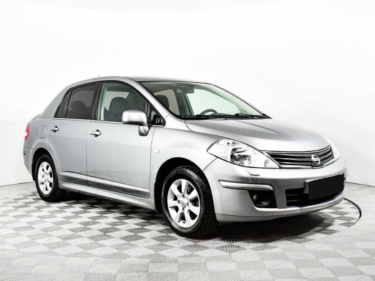 Купить Nissan Tiida с пробегом. Фото: #2