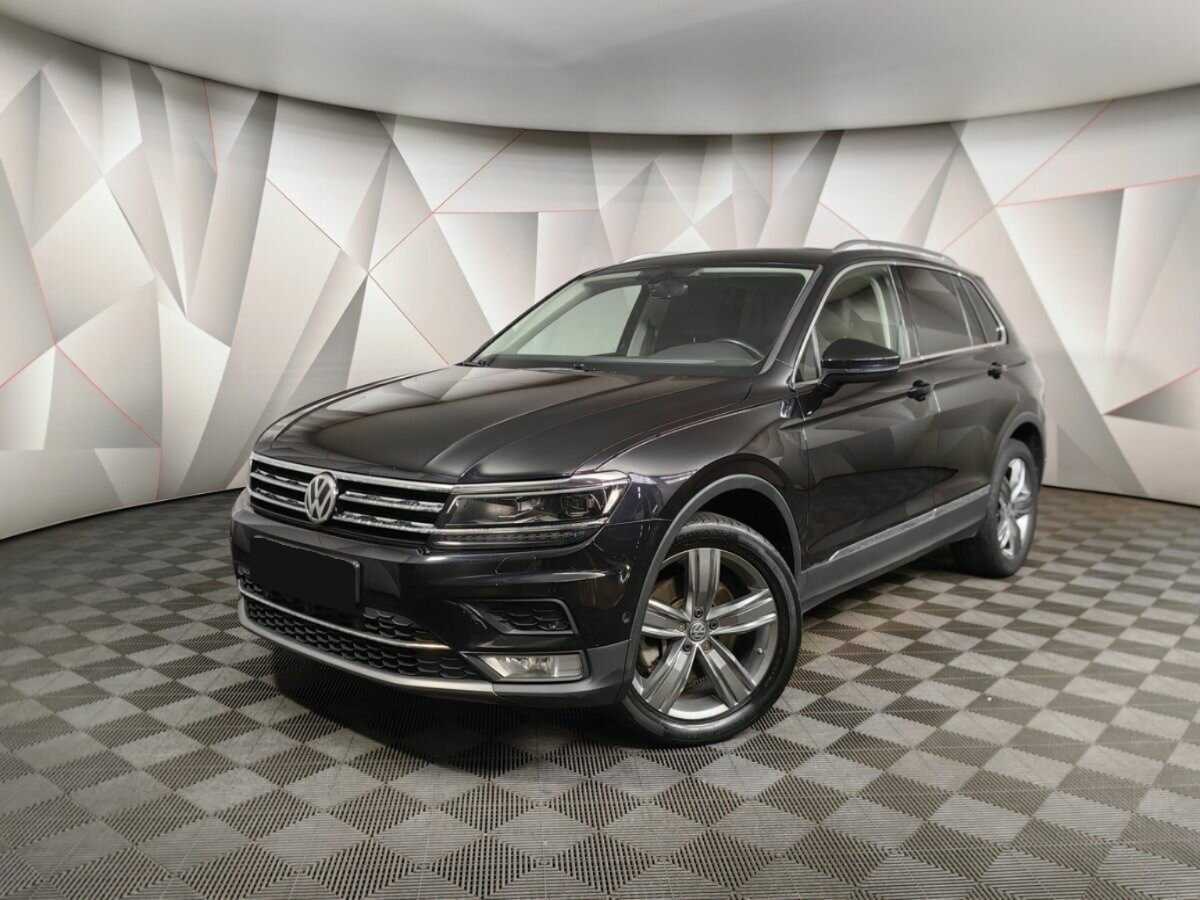 Купить Volkswagen Tiguan с пробегом. Посмотреть фото